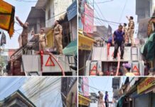 पलटन बाजार में कपड़ों की दुकान में लगी आग को दमकल ने बुझाई।